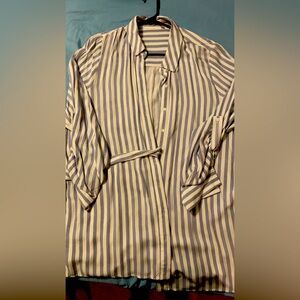 Can be used as a dress or as a top with some cute leggings.